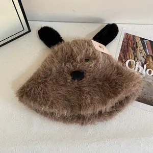 Close-up of brown plush puppy bucket hat featuring long ears and soft furry texture