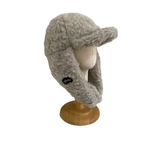 Fuzzy cream yellow fleece aviator trapper hat with thick warmth for winter skiing