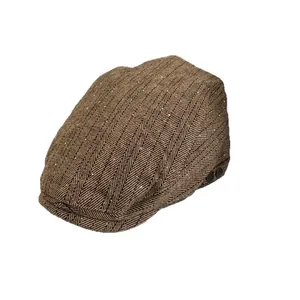Brown herringbone newsboy cap with subtle sequins and decorative side metal buttons