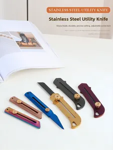 Detail view of colorful stainless steel utility knives with rotary lock and tail hanging hole