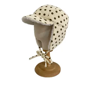 Retro polka dot trapper hat for women with warm faux lamb wool lining and ear flaps