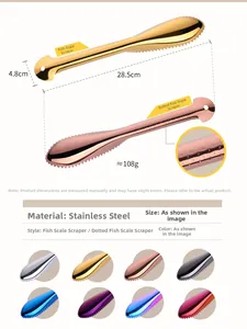 Macro detail of various colorful stainless steel fish scale scrapers for kitchen use