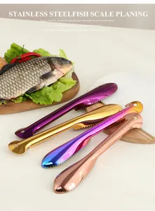 Close-up of four colorful stainless steel fish scalers in a modern kitchen setting