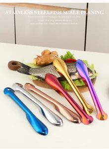 Various colored stainless steel fish scale scrapers in a modern kitchen setting