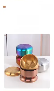 Stackable double-wall stainless steel bowls with lids in various metallic finishes