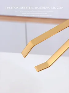 Macro view of gold 304 stainless steel kitchen tweezers with precise closing tip