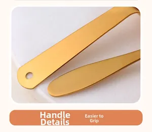 Detail of matte gold 304 stainless steel handle with hanging hole and smooth finish