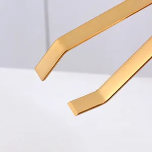 Golden 304 stainless steel food tweezers with a flat slanted head and brushed metal finish