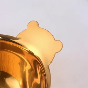 Golden bear shaped stainless steel dipping sauce bowl with a mirror polished finish