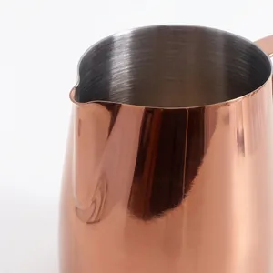 Polished rose gold stainless steel milk frothing pitcher with sharp spout for latte art