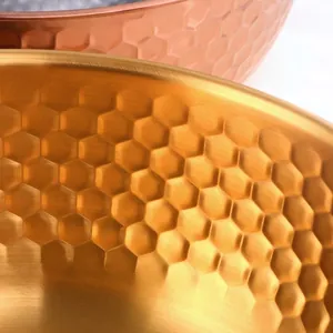 Hammered stainless steel salad bowls in gold and rose gold finish for kitchen use
