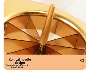 Gros plan d'un coupe-oignon doré en acier inoxydable avec aiguille conique de précision