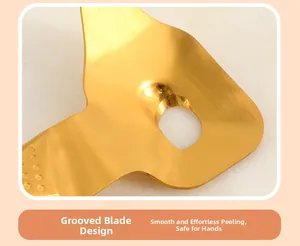 Close-up of golden stainless steel noodle cutter with ergonomic non-slip handle