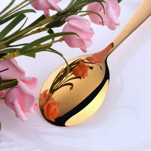 Mirror polished gold stainless steel dinner spoon set with elegant rose decoration