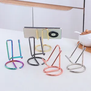 Minimalist metal desk phone stand in multiple colors with stable ring base for tablets