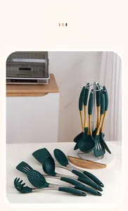 Macro view of dark green silicone kitchen tool set with a rotating storage rack