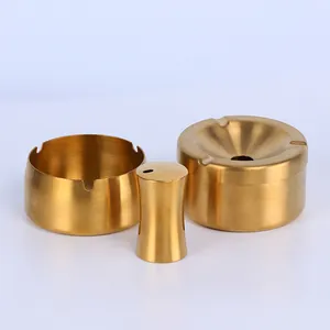 Ensemble de trois cendriers et pot de rangement en acier inoxydable doré brossé