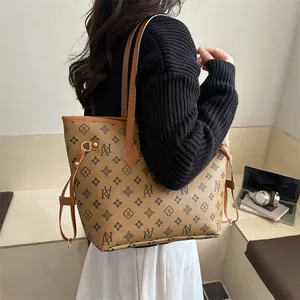 Brown monogram tote bag with AI pattern and leather handles for urban lifestyle