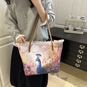 Artistic peacock print large tote bag with fringe detail and brown leather straps