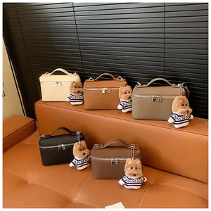 Bolsos box de cuero con diseño de lichi en cinco colores y bonitos colgantes de perro