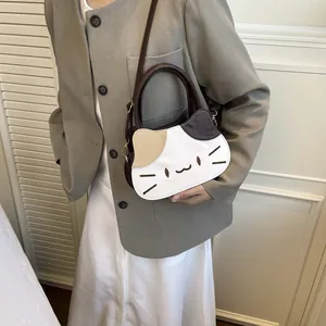 Calico cat shaped crossbody bag with color block design and creative kitten ears