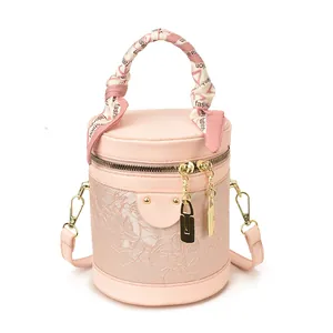 Pink bucket bag with lace embroidery and fashion silk scarf handle detail