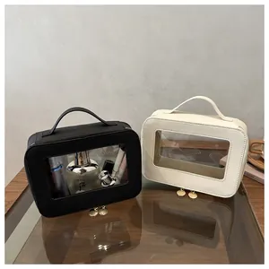 Detail view of stylish waterproof PVC vanity cases in black and white with clear windows