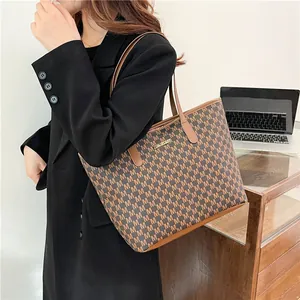 Classic brown tote bag with M-letter print and adjustable shoulder strap for women