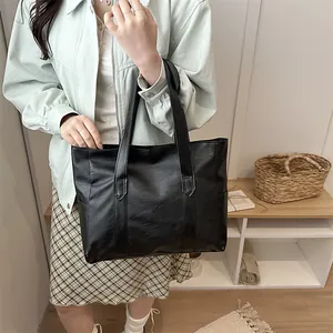 Minimalistische schwarze PU-Leder-Einkaufstasche mit großem Fassungsvermögen und langen Henkeln