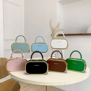 Minimalist chain box handbag in seven colors with spiral handle and gold metal trim