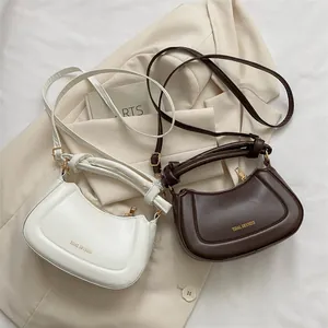 Détails des sacs de selle chic en similicuir avec poignée nouée et marquage doré élégant