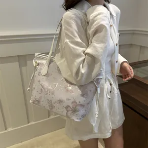 Sac fourre-tout à imprimé papillon pour femme avec motifs d'étoiles et pompons chic