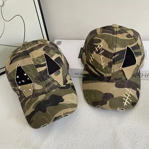 Retro camo baseball caps with silver studs and distressed patch details for men and women
