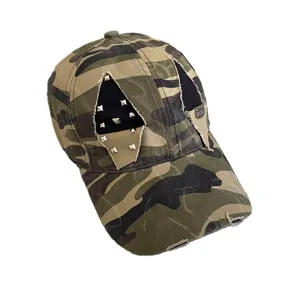 Vintage camouflage baseball cap with punk metal studs and distressed rip details