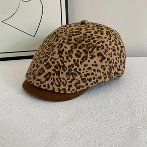 Macro shot of leopard print cap with premium brown suede brim and fine stitching detail