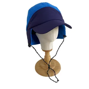 Blue and purple fleece trapper hat with ear flaps and adjustable windproof strap
