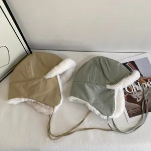 Winter fleece-lined aviator hat with earflaps and long straps in khaki and green