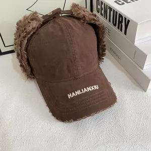Brown canvas aviator hat with plush earflaps and embroidery for winter outdoor wear