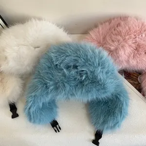Women's faux fur trapper hat in white, blue, and pink for winter warmth and ski outdoor wear