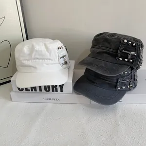 Vintage flat top cotton army cap with metallic studs and industrial zipper details