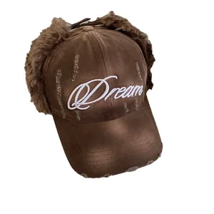 Chapeau trappeur en denim délavé marron avec cache-oreilles en peluche et broderie
