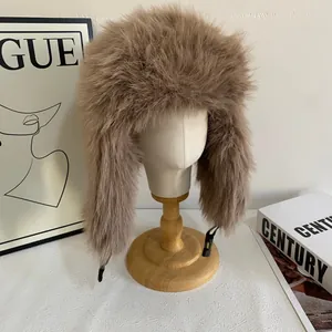 Detail of plush faux fur trapper hat with warm ear flaps and secure buckle closure