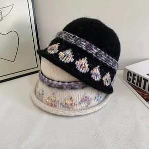 Vintage jacquard knit bucket hat for women in black and beige with warm wool texture