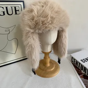 Close-up of thick faux fur trapper hat with ear flaps and buckle on wooden stand