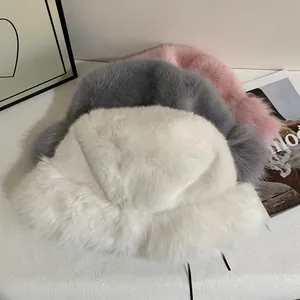 Faux fur bucket hats in white, gray, and pink, warm winter headwear for women