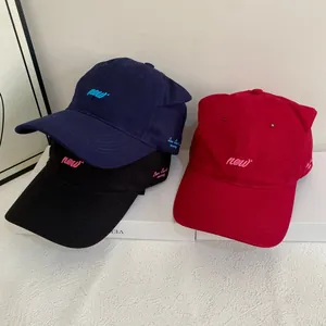 Three minimalist baseball caps with cute cat ears and 'new' embroidery in multiple colors