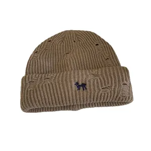 Brown distressed knit beanie with puppy embroidery and ribbed warm winter texture