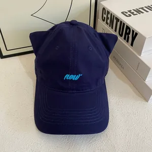 Cute navy blue baseball cap with cat ears and new embroidery in a stylish casual design