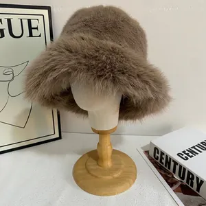 Detailed texture of dark brown faux fur on a warm winter bucket hat for women