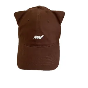 Brown baseball cap with cute cat ear design and white 'new' embroidery for women